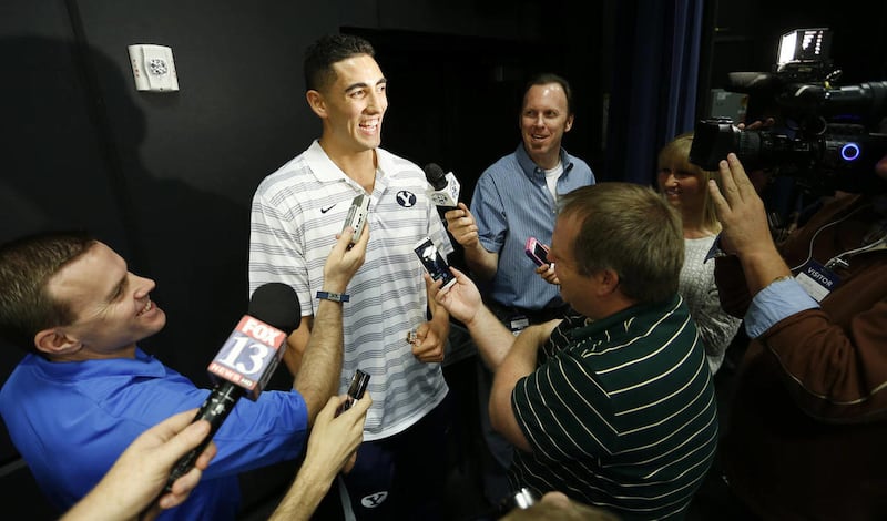 Brigham Young Cougars center Corbin Kaufusi (44) speaks to media during media day in Provo Thursday, Oct. 2, 2014.