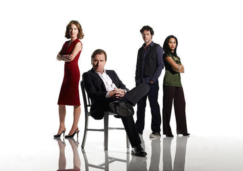 Kelli Williams, left, Tim Roth, Brendan Hines and Monica Raymund star in "Lie to Me."
