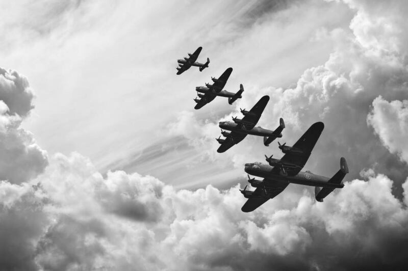 A black and white retro image of Lancaster bombers from the Battle of Britain in World War II.