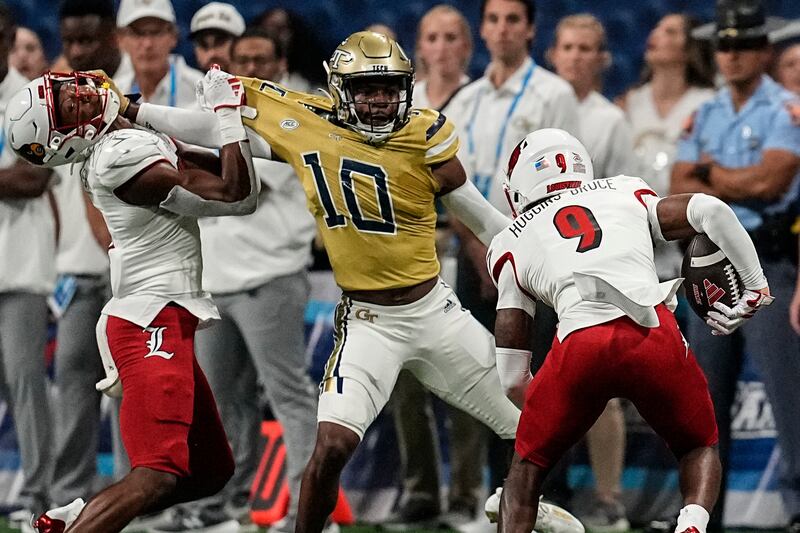Georgia Tech defensive back Kenan Johnson (10) battles to make a play during game against Louisville, Friday, Sept. 1, 2023, in Atlanta.  The former Yellow Jacket transferred to Utah in the offseason.