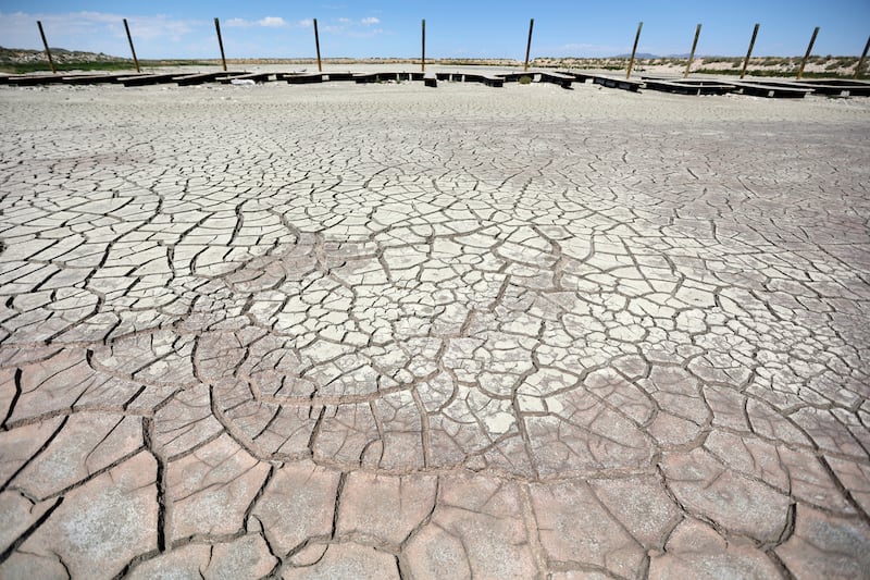 The dry lakebed of the Great Salt Lake is exposed during a drought where the lake is at record low levels.
