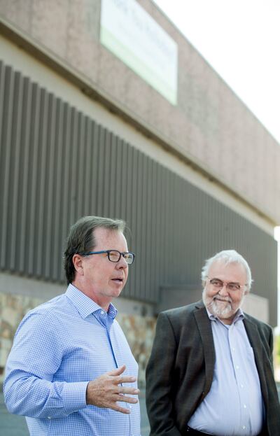 Clark Ivory, left, and Jeff Woodbury stand at the site of the former Cottonwood Mall in Holladay on Thursday, Sept. 6, 2018.
