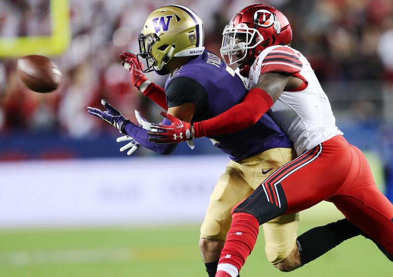 Utah Utes defensive back Jaylon Johnson (1) defends Washington Huskies wide receiver Aaron Fuller (2) on a pass play in the Pac-12 championship game at Levi’s Stadium in Santa Clara on Friday, Nov. 30, 2018.