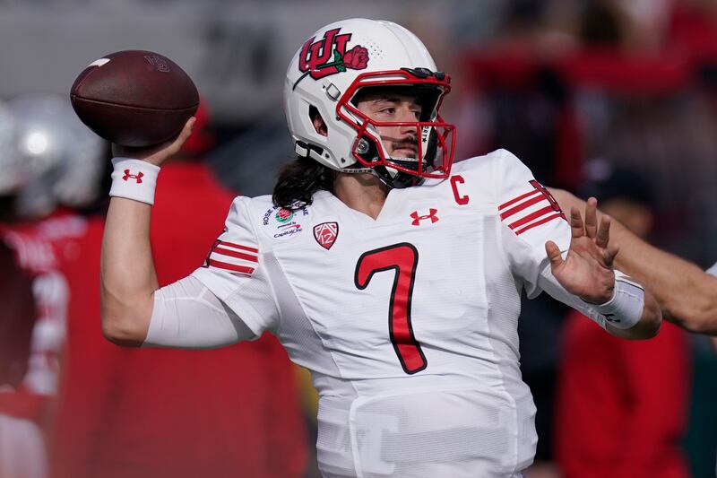 Utah quarterback Cameron Rising warms ups before the Rose Bowl NCAA college football game against Ohio State, Saturday, Jan. 1, 2022, in Pasadena, Calif.