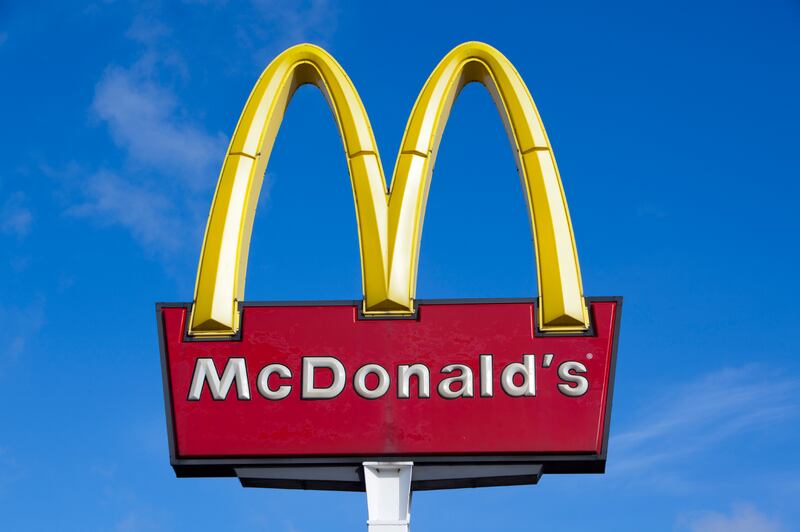 McDonald’s logo against blue sky. The store is giving free “Thank You Meals” to first responders starting Wednesday.