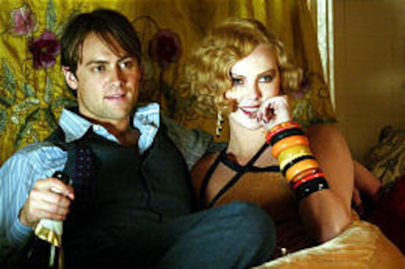 Off-screen romantic pair Stuart Townshend and Charlize Theron fail to make sparks on-screen in wartime romance "Head in the Clouds."