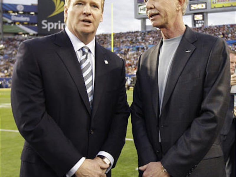 Chesley "Sully" Sullenberger, right, the pilot of US Airways Flight 1549 that crashed into the Hudson River Jan. 15 in New York, talks to NFL commissioner Roger Goodell before the NFL Super Bowl XLIII football game between the Pittsburgh Steelers and the