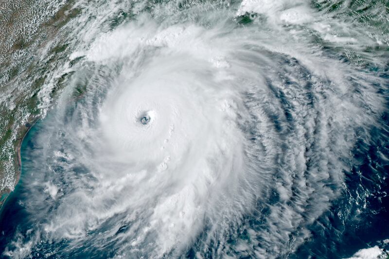 This GOES-16 GeoColor satellite image taken Wednesday, Aug. 26, 2020, at 4:50 p.m. EDT., and provided by NOAA, shows Hurricane Laura over the Gulf of Mexico. Hurricane Laura strengthened Wednesday into “an extremely dangerous Category 4 hurricane,” The National Hurricane Center said.