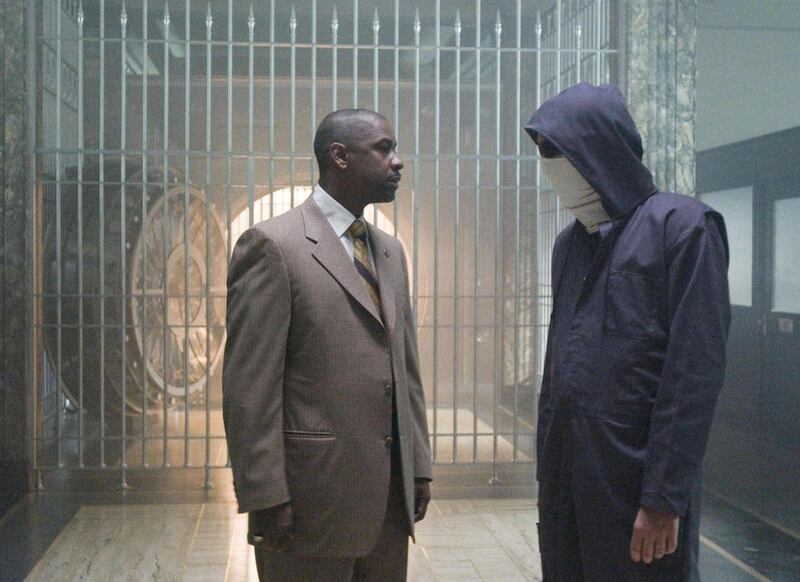 In this photo provided by Universal, Denzel Washington, left, and Clive Owen are shown in a scene from "Inside Man."