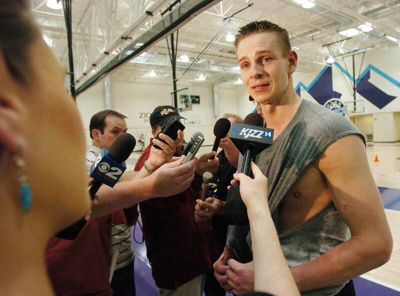 Former USU basketball star Spencer Nelson talks to the media after a workout with the Utah Jazz Thursday June 2, 2005. Photo by Scott G. Winterton/Deseret Morning News June 2, 2005. (Submission date: 06/02/2005)