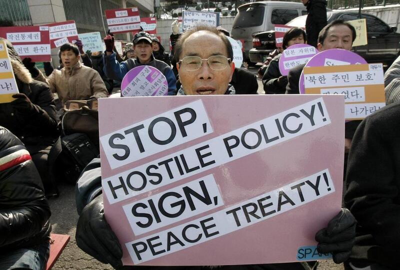 South Korean protesters stage a rally against the South Korean government's policies on North Korea in front of the Defense Ministry in Seoul, South Korea, Friday, Jan. 28, 2011. North Korea on Friday proposed holding parliamentary talks with South Korea