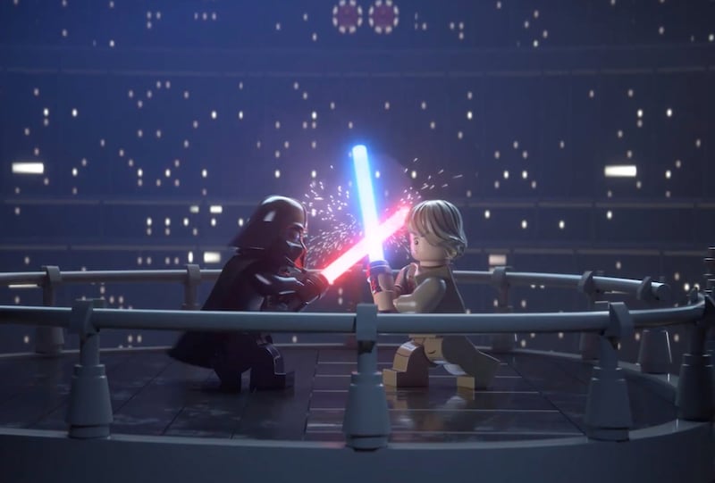 Lego Darth Vader and Luke Skywalker duel in “Lego Star Wars: The Skywalker Saga.”
