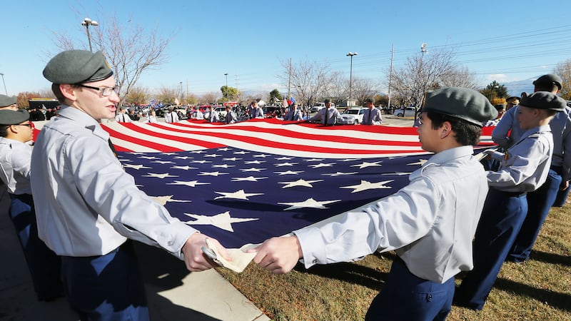 Taylorsville High School ROTC members prepare to march in the Veterans Day parade honoring women in the military in 2004.