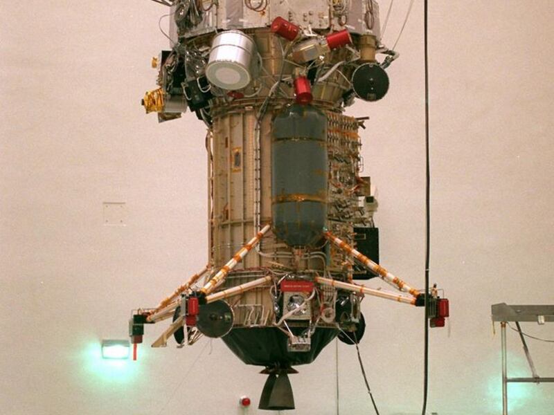 In this Friday Sept. 20, 1996 file photo, NASA's Jet Propulsion Laboratory engineers and technicians lower the 3,420-pound Cassini Spacecraft into the Launch-Vehicle-Adapter at JPL in Pasadena, Calif. On Wednesday night, members of the Salt Lake Astronomi