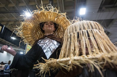 Maxwell Braun, 10, left, and Benjamin Braun, 7, dressed as
The Storms in the 1986 film “Big Trouble in Little China,” attend FanX Salt Lake Comic Convention at the Salt Palace Convention Center in Salt Lake City on Saturday, Sept. 8, 2018.