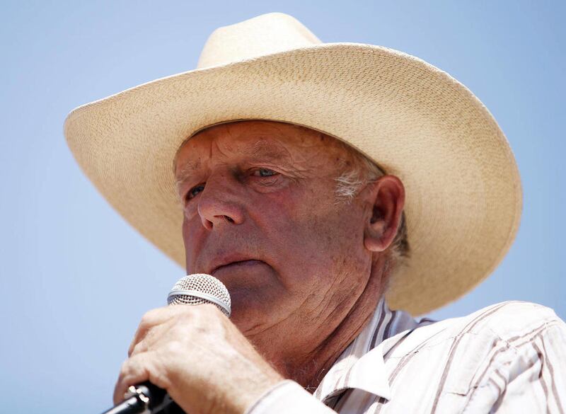 In this April 24, 2014, file photo, rancher Cliven Bundy speaks at a news conference near Bunkerville, Nev. A Las Vegas schoolteacher is suing Bundy, blaming him for her injuries and damage to her car in a crash with a Bundy cow on Interstate 15 near Mesq