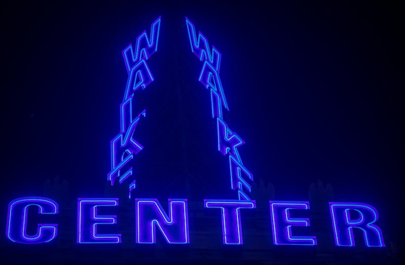 The Walker Center tower lit up in its default blue for clear skies Friday night.