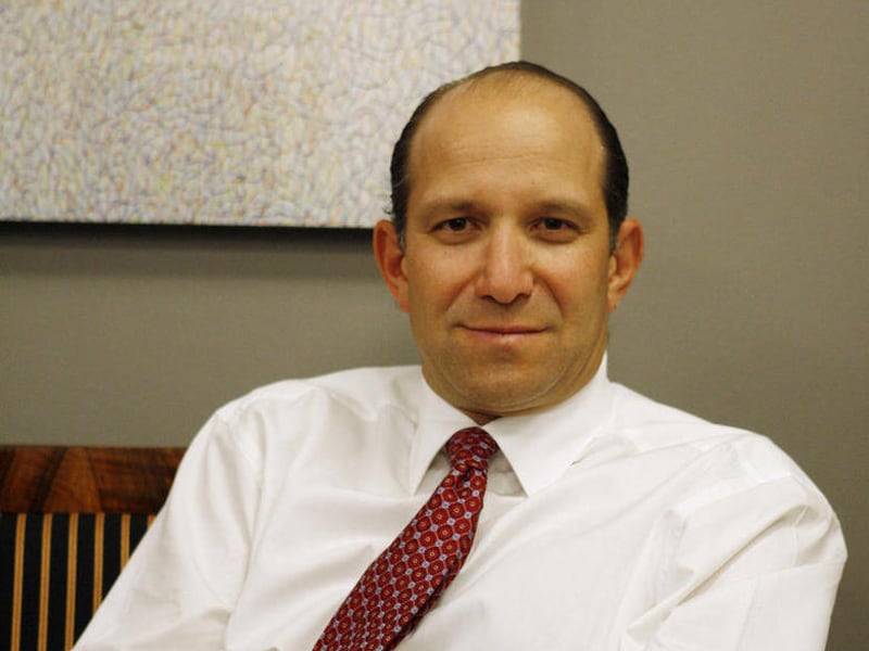 FILE In this Aug. 25, 2006 photo, Howard Lutnick, CEO of Cantor Fitzgerald, poses in his New York office. It's a name inextricably linked with Sept. 11, with huge, catastrophic loss, Cantor Fitzgerald. Of the companies and organizations that lost people