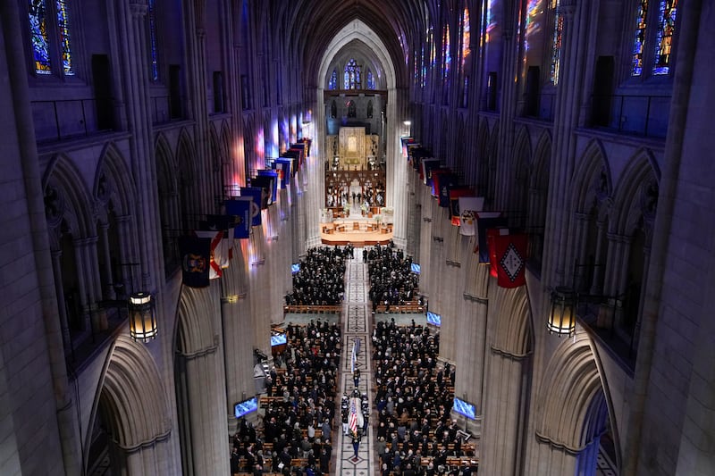 A military team carries the casket after the funeral for former Secretary of State Colin Powell at the Washington National Cathedral on Nov. 5, 2021.