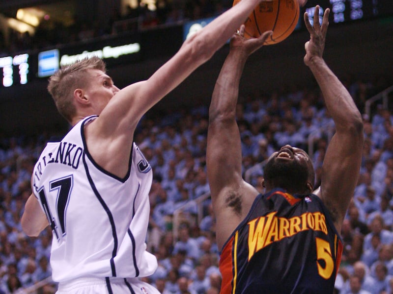 Andrei Kirilenko blocks the shot of Baron Davis during game two of the Western Conference semi-finals between the Jazz and Warriors in 2007.