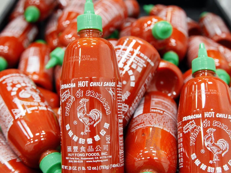 Sriracha chili sauce bottles.