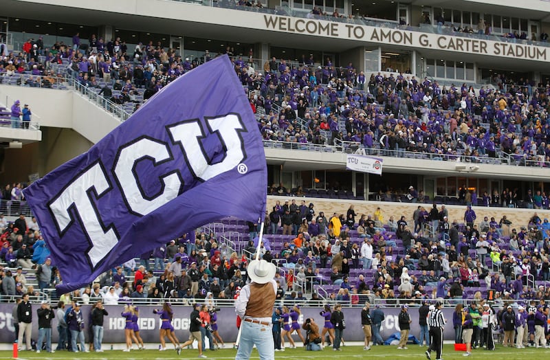 A TCU flag waves during a college football game on Oct. 6, 2012.