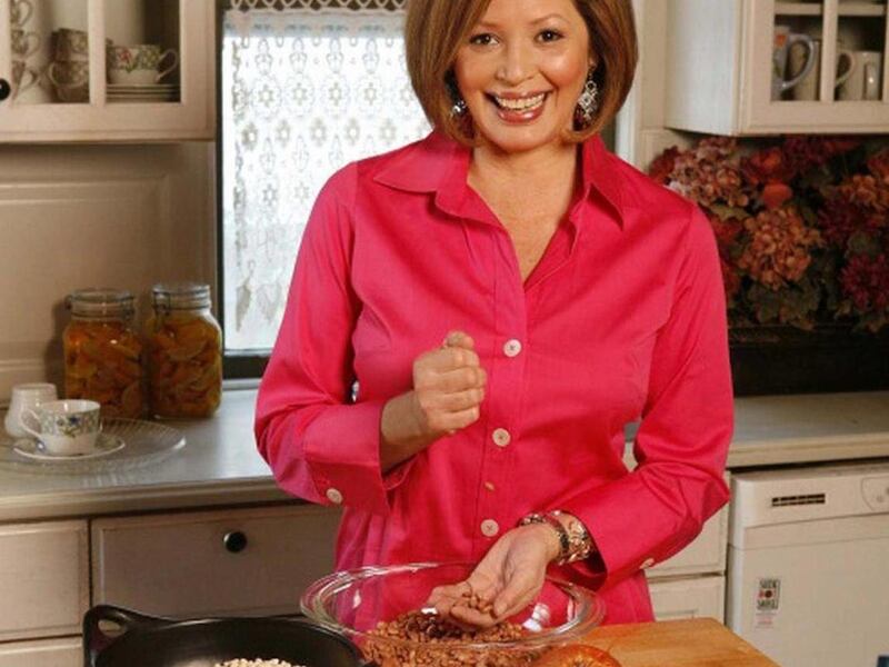 FILE- This undated file photo released by the Food Network shows chef Daisy Martinez. Martinez says coquito _ an intensely rich Puerto Rican version of eggnog _ is a must in her family"™s home during the holidays. And this is no everyday drink. Made from
