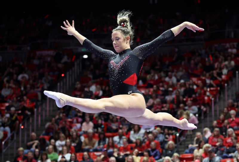 Utah’s Jaylene Gilstrap does her beam routine.