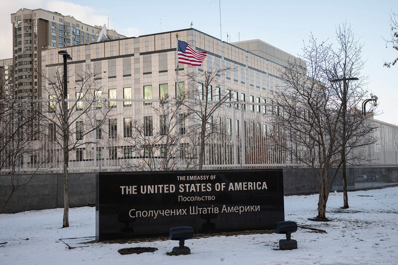 A view of the U.S. Embassy in Kyiv, Ukraine, Saturday, Feb. 12, 2022. U.S. officials told The Associated Press that the State Department plans to announce Saturday that virtually all American staff at the Kyiv embassy will be required to leave. The State Department would not comment. The department had earlier ordered families of U.S. embassy staffers in Kyiv to leave. But it had left it to the discretion of nonessential personnel if they wanted to depart. 