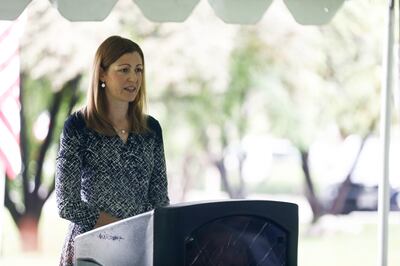 Congressman Ben McAdam's wife, Julie McAdams, speaks during a Memorial Day ceremony at Wasatch Lawn Memorial Park in Salt Lake City on Monday, May 27, 2019.