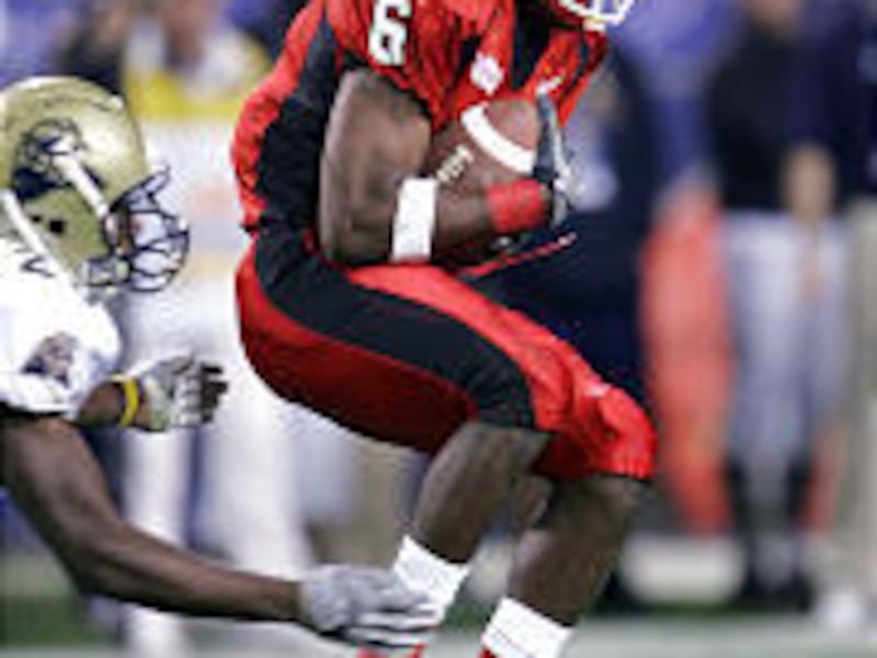 Steve Savoy, who will leave the Utes to enter the NFL draft, catches the ball during the first half of the 2005 Fiesta Bowl. He caught 107 passes for 1,624 yards in two seasons at Utah.