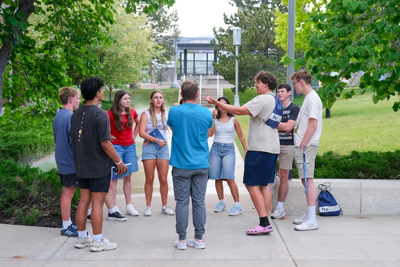 An FSY counselor and company of youth meet at a For the Strength of Youth session in Salt Lake City in 2025.