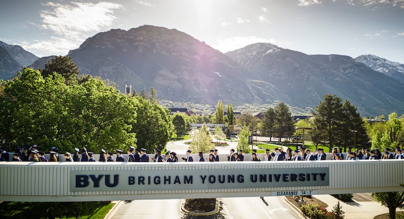 Graduates line up for processional prior to BYU commencement exercises held in the Marriott Center in Provo, Utah, on Thursday, April 25, 2024.