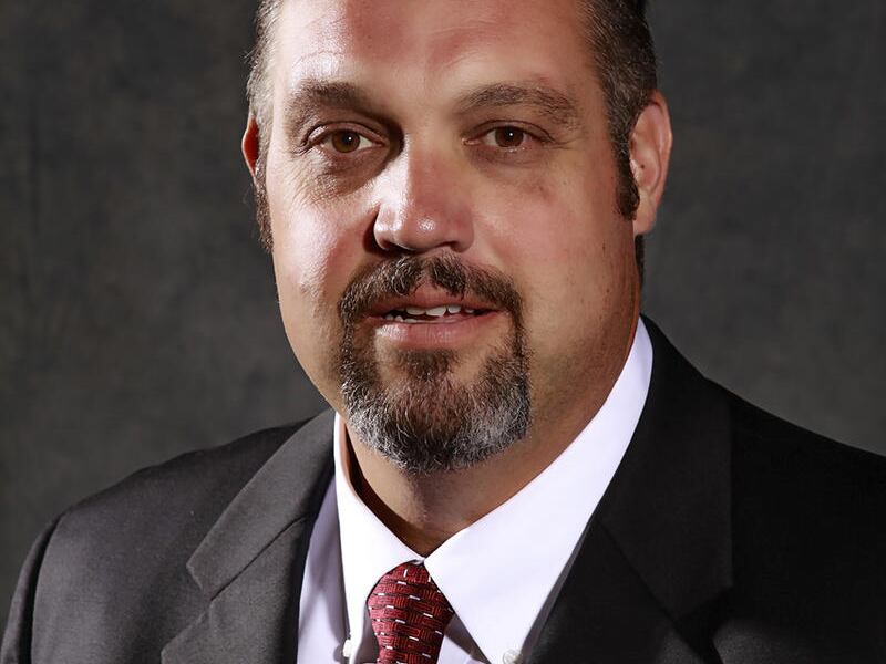 DSU head football coach Scott Brumfield poses for a picture.