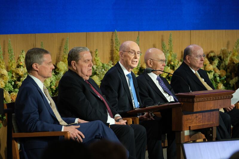 President Henry B. Eyring, second counselor in the First Presidency, center, speaks.