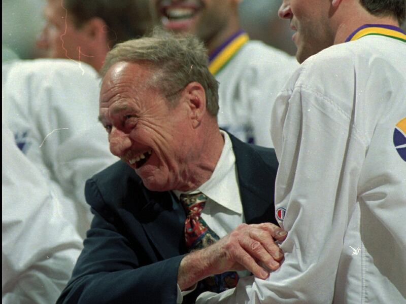 Jazz trainer Don Sparks clowns it up with Jeff Hornacek at the beginning of a game near the end of the regular season.