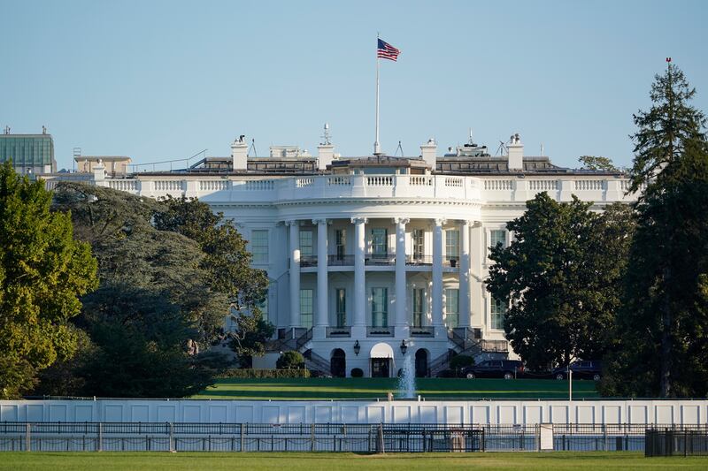 The White House is seen in Washington, early Saturday, Oct. 3, 2020, the morning after President Donald Trump was taken to a military hospital after being stricken by COVID-19.