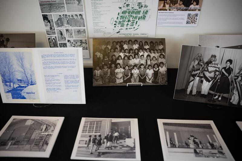 Photographs from various Native American boarding schools are displayed during a panel discussion hosted by Utah Diné Bikéyah at the Leonardo Museum in Salt Lake City on Saturday.