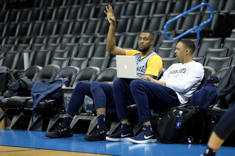 Utah Jazz forward Derrick Favors (15) talks with coach Antonio Lang as the Utah Jazz players practice as they prepare to play the Oklahoma City Thunder in game two of the NBA playoffs in Oklahoma City on Monday, April 16, 2018.