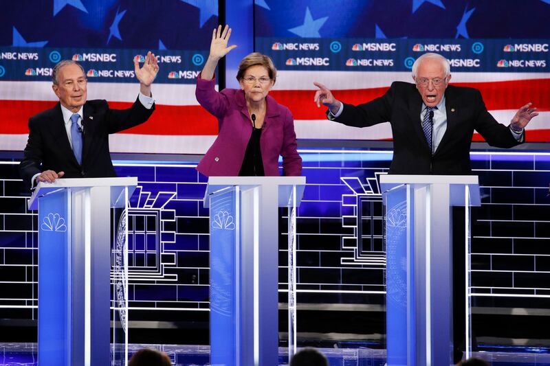 From left, Democratic presidential candidates, former New York City Mayor Mike Bloomberg, Sen. Elizabeth Warren, D-Mass., Sen. Bernie Sanders, I-Vt., participate in a Democratic presidential primary debate Wednesday, Feb. 19, 2020, in Las Vegas, hosted by NBC News and MSNBC.