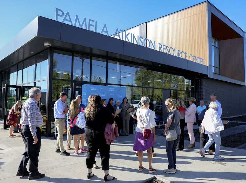 People mingle at the Pamela Atkinson Resource Center in South Salt Lake on Thursday. The facility was formerly known as the Men's Resource Center.