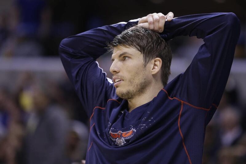 Atlanta Hawks forward Kyle Korver watches from the bench in the first half of an NBA first round playoff basketball game against the Indiana Pacers in Indianapolis, Wednesday, April 24, 2013. Korver is once again a free agent, and he likely will sign a de