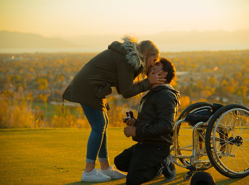 Aaron "Wheelz" Fotheringham shares a kiss with his now wife, Charlee Wilson, after he proposed marriage. The couple was married in the Las Vegas Nevada Temple of the LDS Church on Feb. 10, 2018.