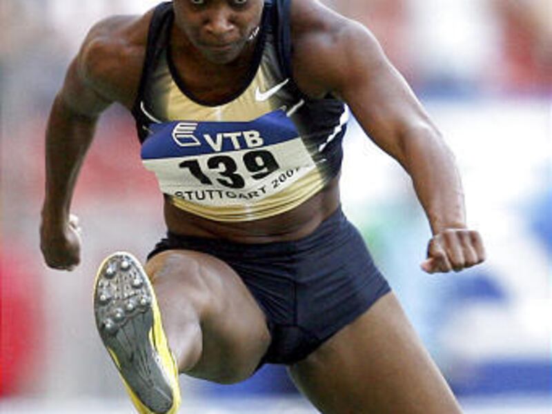Michelle Perry from the U.S. competes during the Women's 100 meters hurdles competition during the IAAF World Athletics Final at the Gottlieb Daimler stadium in Stuttgart, Germany.