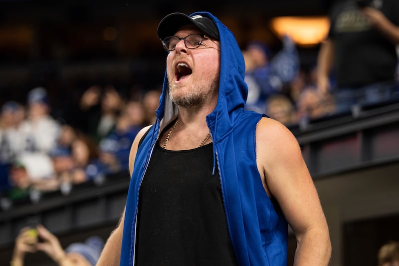Former Indianapolis Colts punter Pat McAfee yells from the stands during an NFL football game on Nov. 4, 2021.