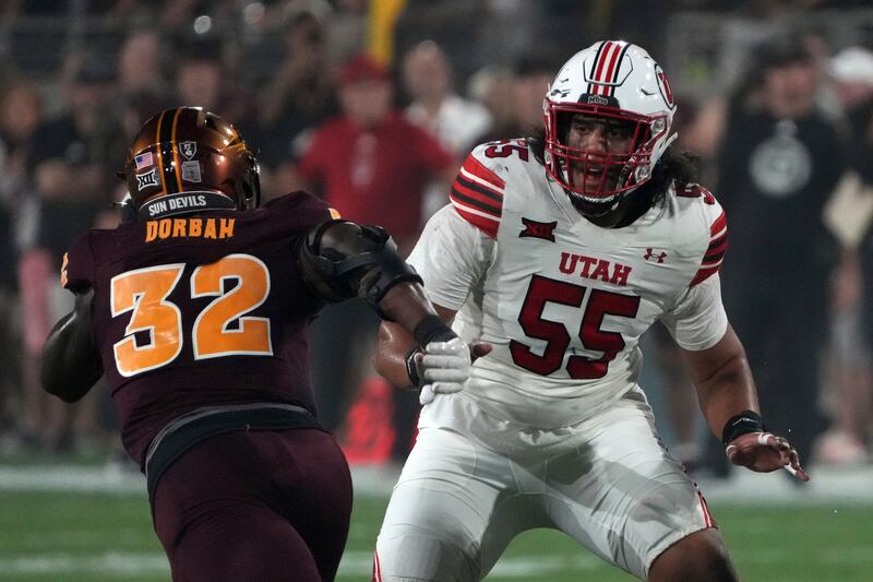 Utah offensive lineman Spencer Fano (55) in the first half during a game against Arizona State, Friday, Oct. 11, 2024, in Tempe, Ariz.