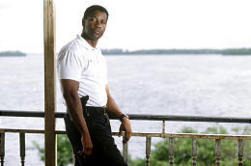 Denzel Washington stars as Matt Whitlock, the chief of police in a tiny Florida town, in the suspense thriller, "Out of Time."