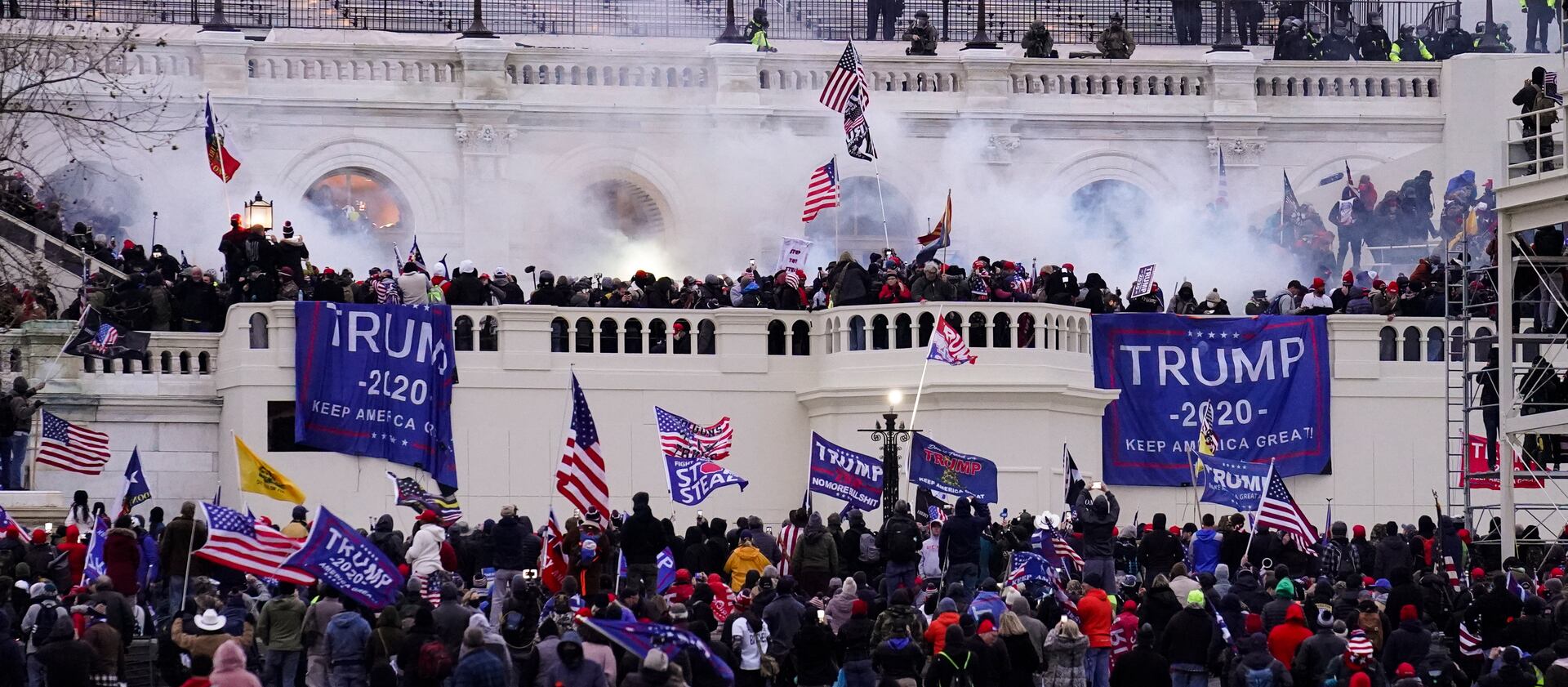 Violent protesters loyal to President Donald Trump storm the Capitol on Wednesday, Jan. 6, 2021, in Washington.