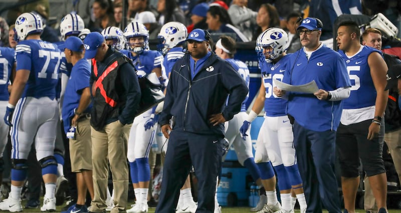 Brigham Young Cougars head coach Kalani Sitake watches from the sideline as the game starts to slip away during the Utah State versus BYU football game at LaVell Edwards Stadium in Provo on Friday, Oct. 5, 2018.