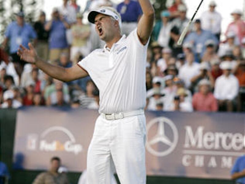 Daniel Chopra, of Sweden, reacts after nearly making a putt for eagle on the fourth playoff hole to win the Mercedes-Benz tourney.